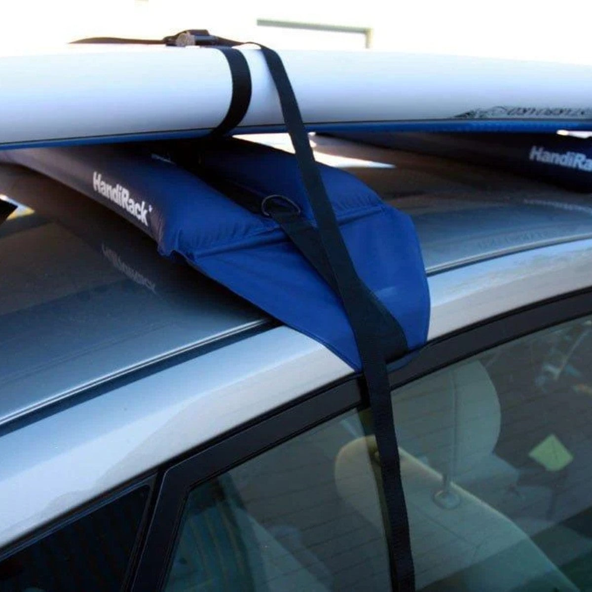 Handirack inflatable sup roof rack with a sup on the car roof
