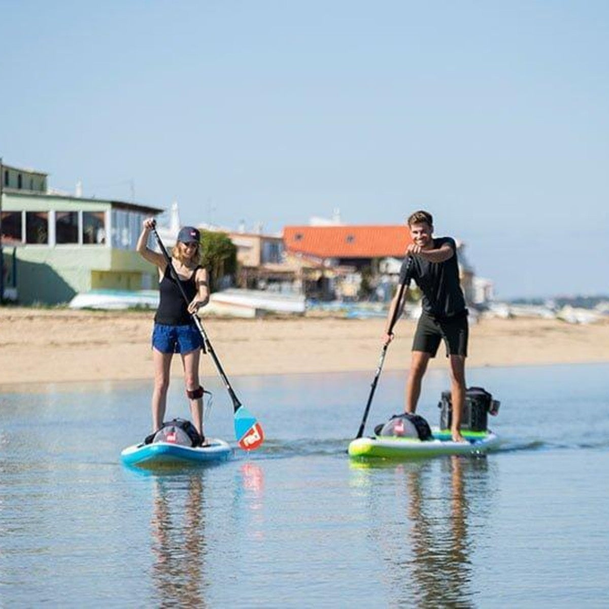Red Original sup carry strap while paddling